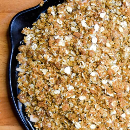 The ultimate oat crumble topping in a skillet.